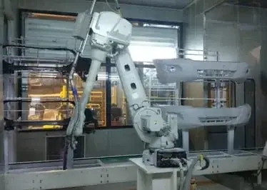 HA-TEC paint robot in an automotive paint booth